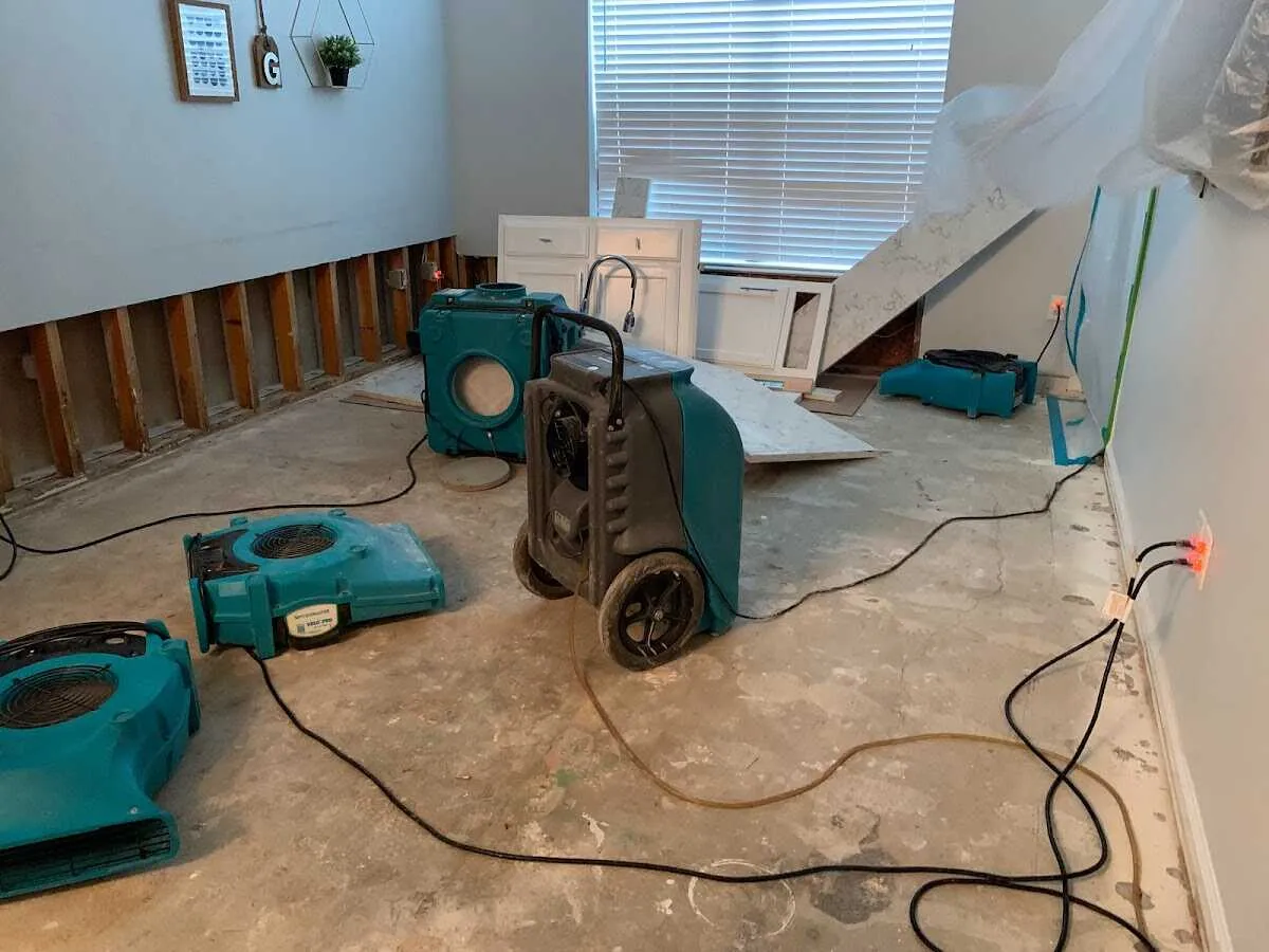 Dehumidifier in flood-cut room for Water Damage Restoration in Glocester