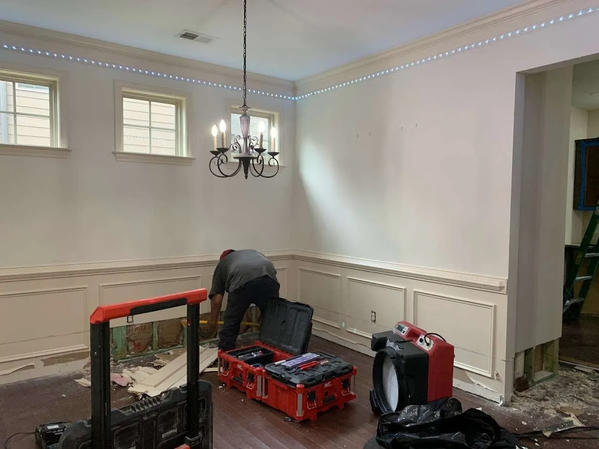 Restoration technician with professional equipment in Glocester